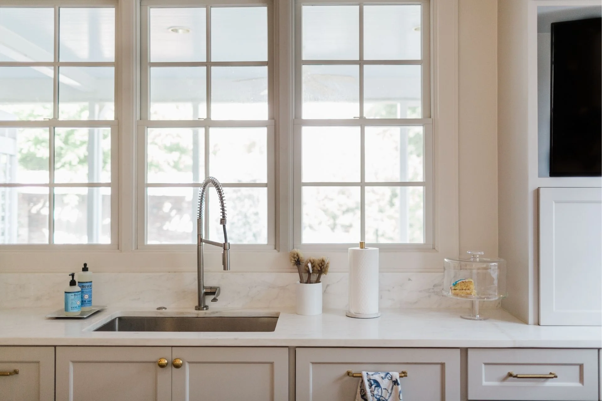 remodeled white kitchen with sink